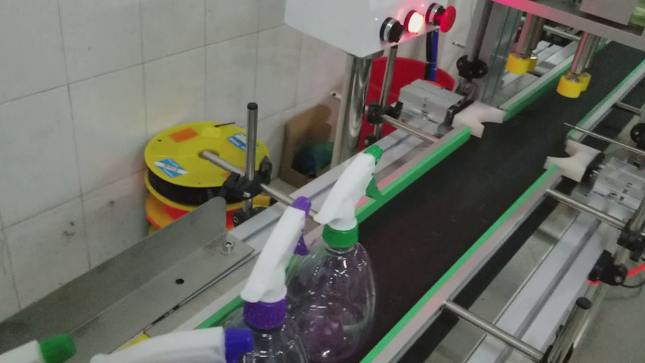 Sinparto spray bottle cap locking machine with conveyor YouTube