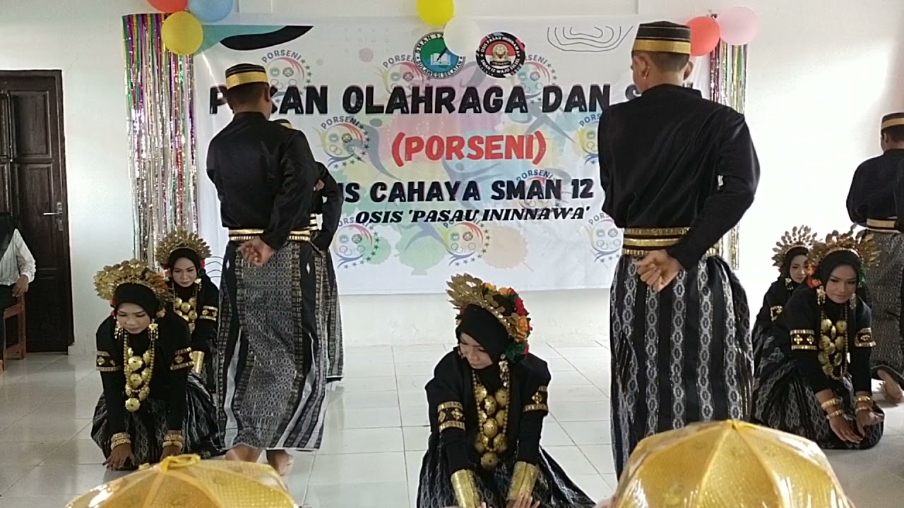 ROMANTIS!!! Tari Ambo Logo Indo Logo Kelas XII MIPA 2 SMAN 12 WAJO