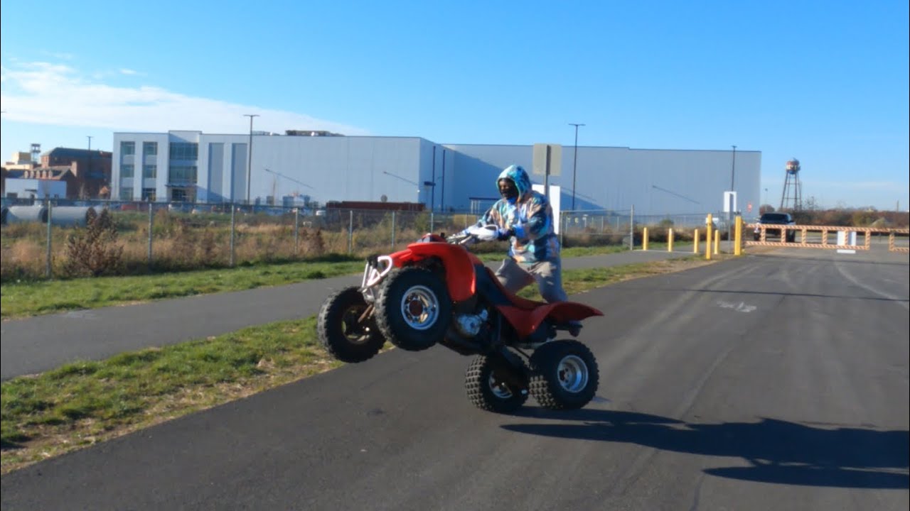 Wheeling a quad on one wheel YouTube
