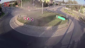 Watch Car Careen Over Roundabout & Fly into the Air in Shocking CCTV Footage