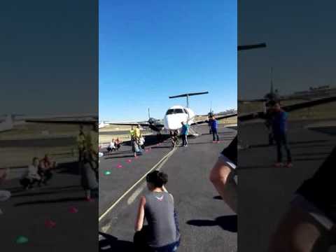 First women pulling a plane