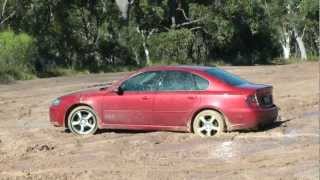 Subaru liberty getting out of a boggy situation in the mud! 2