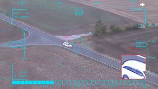 White estate through the bend — AI target lock & tracking from a UAV