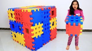 Shfa and twin  Playing with Toy Blocks