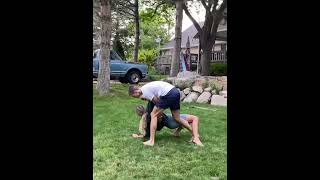 Playful Backyard Wrestling Fun Outdoor Activity