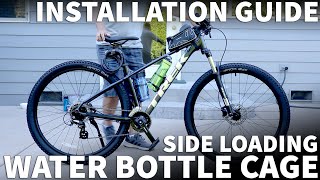 How to Install Bottle Cage on Mountain Bike - Attach Side Load Water Bottle Holder on Bicycle or MTB by digitalcamproducer 7,316 views 1 year ago 2 minutes, 25 seconds