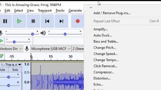 Recording into Audacity using a backing track and a USB microphone.