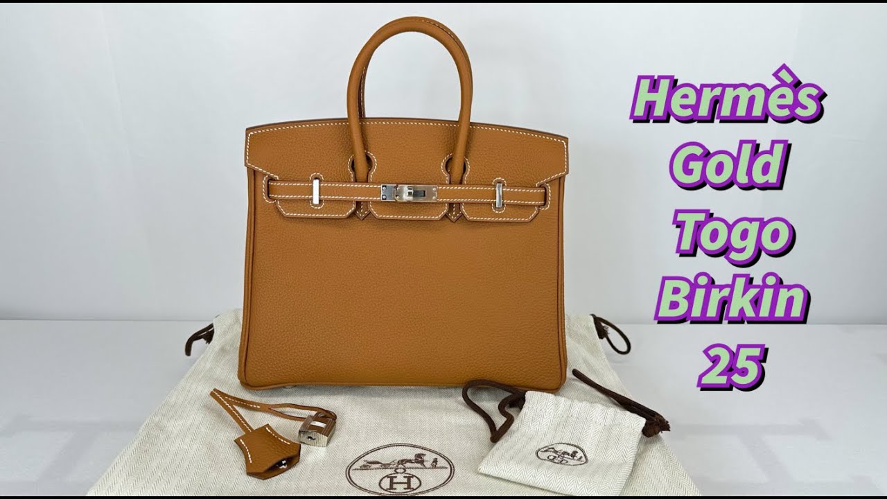 AN ORANGE H TOGO LEATHER BIRKIN 25 WITH GOLD HARDWARE