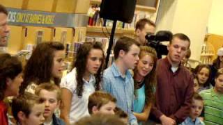 The Duggars enter and sing at Barnes & Noble book signing in Tulsa