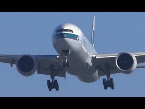 airbus a220 Cathay Pacific Airways Boeing 777-300ER Landing 28 Chicago O'Hare Airport from VHHH / HKG