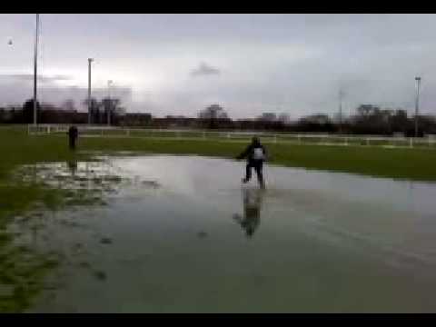 ben fidler runnin in a huge puddle