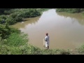 Pesca con atarraya. Canal del dique. Atlántico.  Colombia