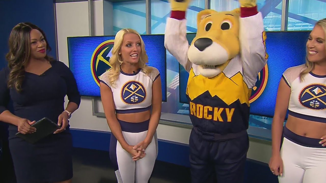 Rocky helps First at 4 anchors get ready for the Denver Nuggets home