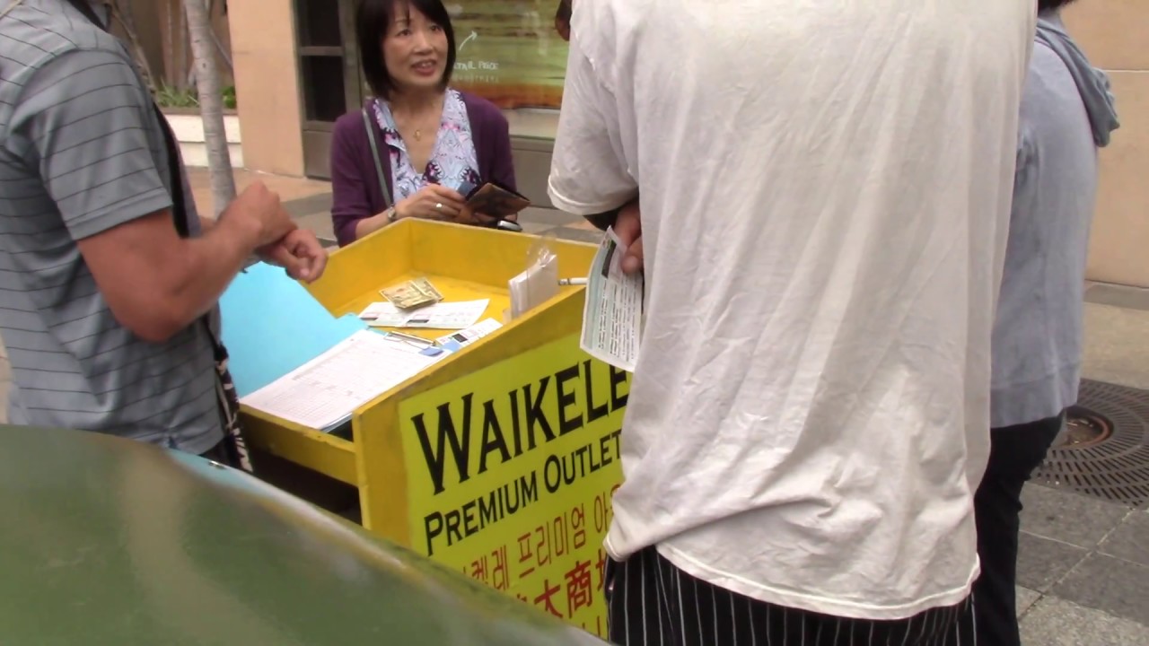 Waikele Shuttle taking cash on the public sidewalk in Waikiki. YouTube