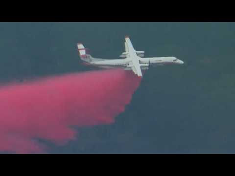 Queensland bushfires threaten homes as residents urged to stay alert