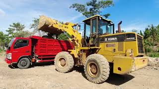 Heavy Construction Equipment, Dump Trucks and Wheel Loaders