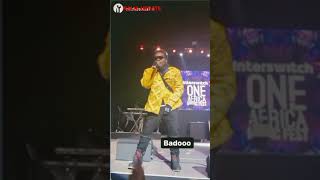 A fan becomes owner of #olamide  jacket , as he struggles to catch it at a concert #music