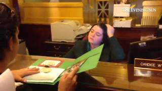 Cara Salemme Gives Info Packet To Secretary In S Office.