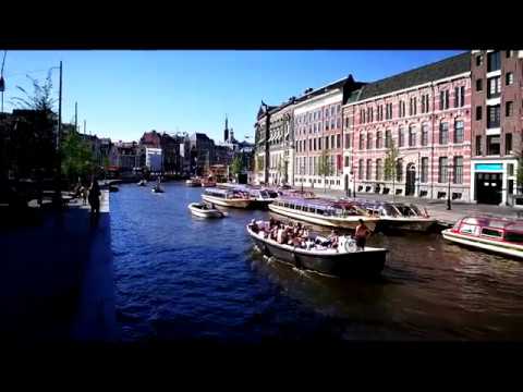 Video: Amsterdamas Transformavo Apleistus Tilto Namus į „Saldumynų“viešbutį