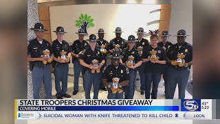Alabama State Troopers spread holiday cheer to young patients