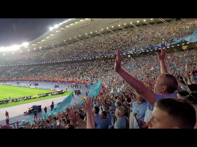 Manchester City fans sing: We are the Champions'' after winning the champions league in 2023 class=