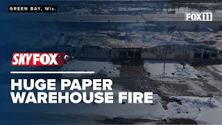 Fire at Green Bay Converting as seen from the air; SKYFOX drone video