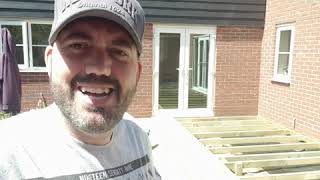 How to build garden decking against a house and doors - two walls