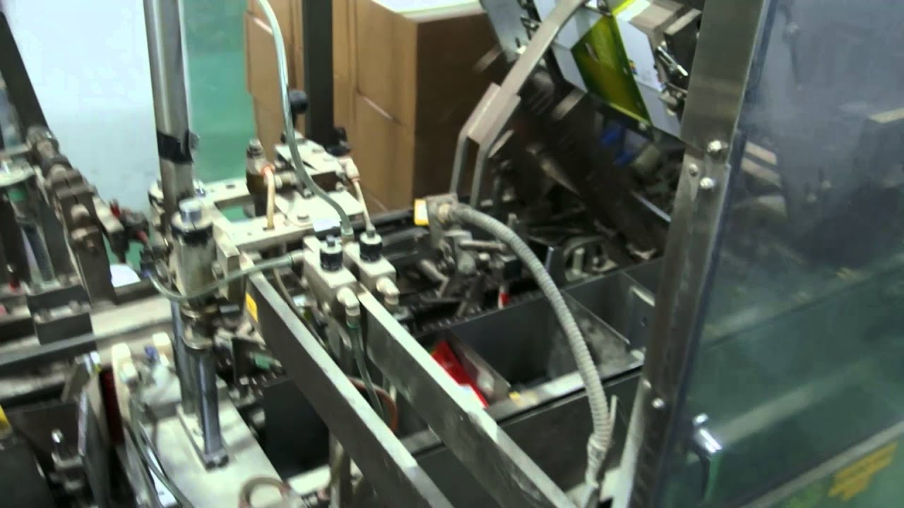 Thiele Horizontal Intermittent Motion Cartoner - YouTube