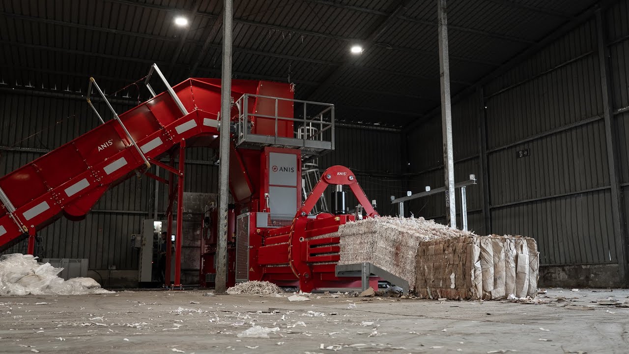 ANIS Channel Waste Baler model ATS110-75S-5V with a robust TGV14-150 in-pit conveyor