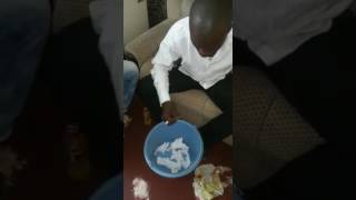 Crazy. A magician in afrika turns shredded papers into money
