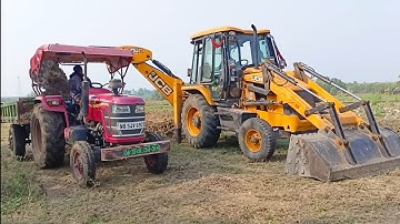 New Jcb 3dx Backhoe Loader Machine Loading Red Mud In Mahindra YUVO 575 DI Tractor | Jcb Video | Jcb