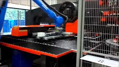 Motoman robots with Amada CNC punching machine and press brake