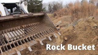 CLEANING UP WITH ROCK BUCKET
