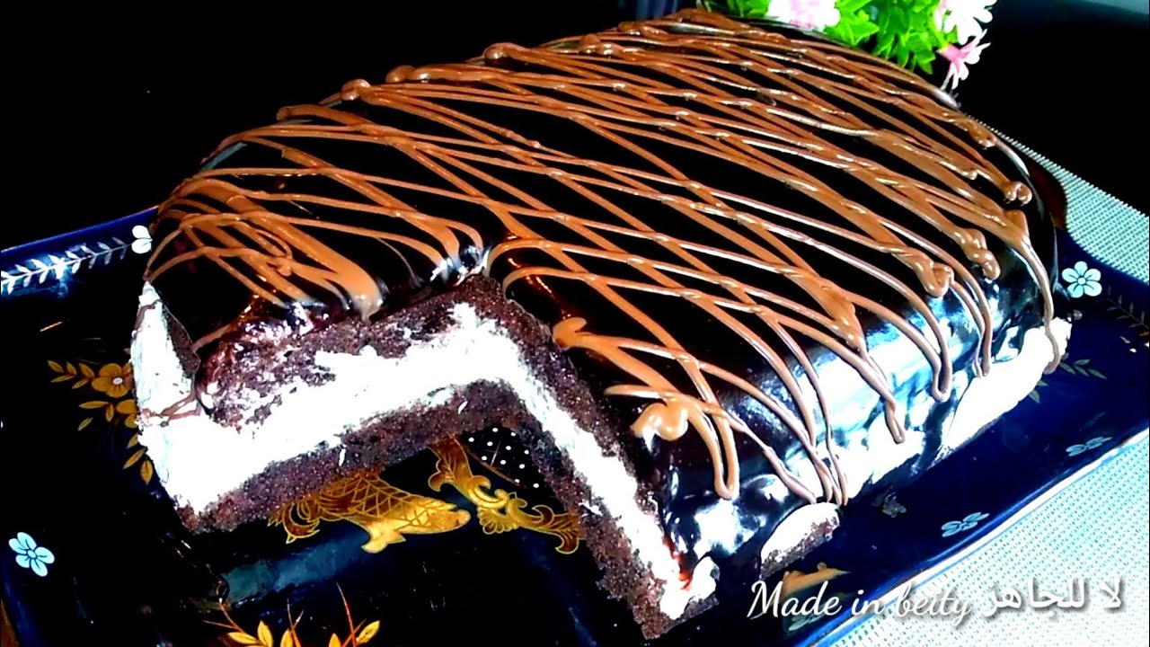 لو لسه مجربتوش كيكة باونتي التركية يبقي فاتكوا كتيير غنية بطعم الشوكولاتة وجوز الهند