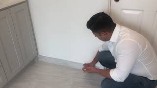Tile Baseboard in Master Bathroom