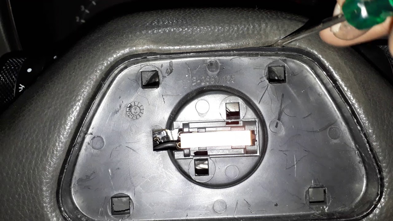 Como sacar el volante del Escort 95