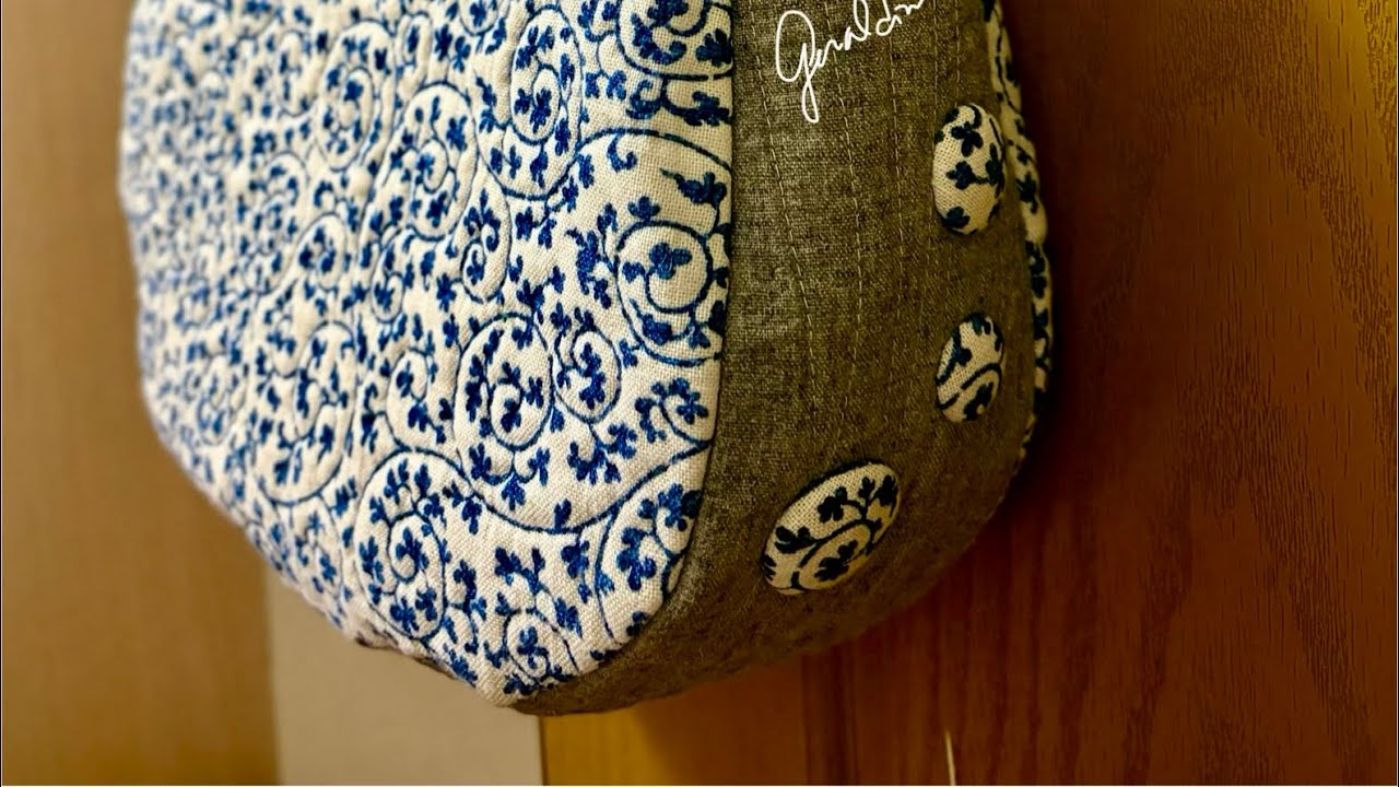 弧度袋形與直線側身的完美組合