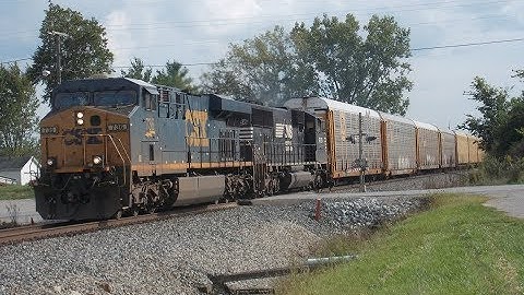 CSX 736 leads NS 288 north through Ossian