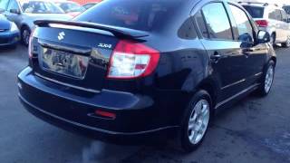 Metro Pre-Owned - 2009 Suzuki SX4 Base