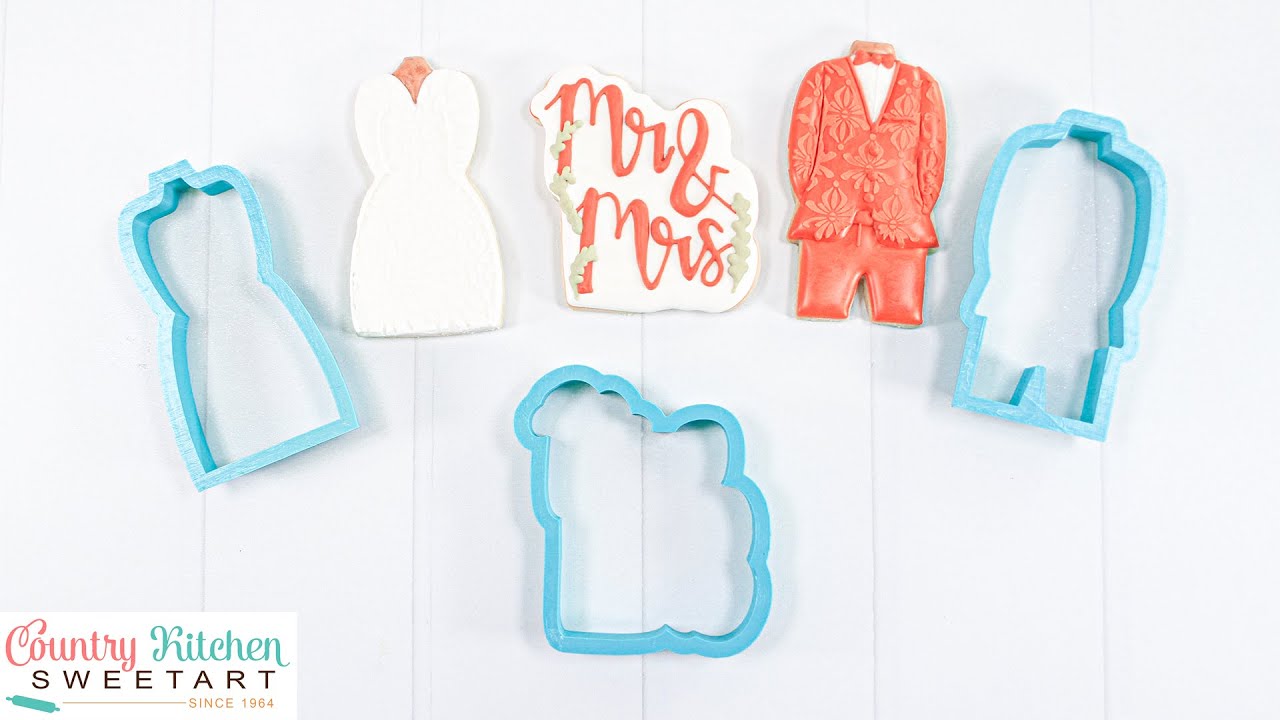 Как нанести трафаретную роспись на сахарное печенье с помощью королевской глазури