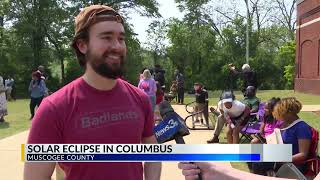 Students, residents gather to watch partial eclipse at Coca-Cola Space Science Center screenshot 1