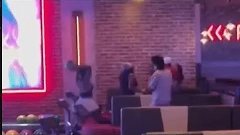 Bowling alley brawl in Miami - lady gets KO by bowling ball