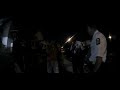 Officers face angry crowd while looking for evidence.