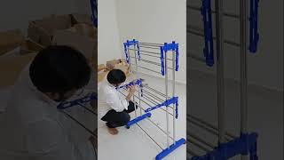 Assembling a cloth dryer stand