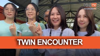 Harapan's candidate and twin sister runs into twins at polling centre