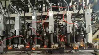 The glass bottles are made by machine
