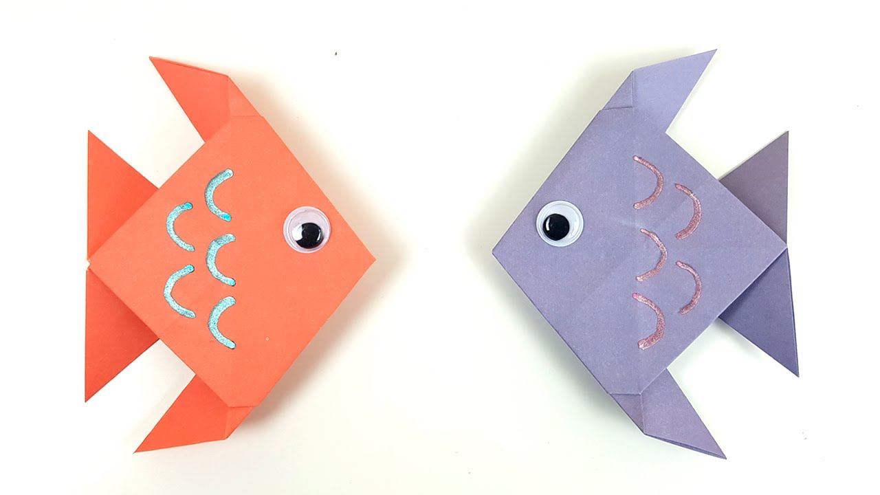 Оригами рыбка в старшей группе. Поделка рыба из бумаги. Оригами рыба. Оригами рыбка из бумаги. Рыбка оригами из бумаги для детей простая.