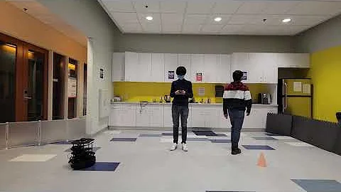 Socially Aware Robot Crowd Navigation with Interaction Graphs and Human Trajectory Prediction