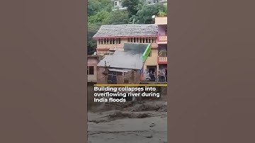 Building collapses into overflowing river during India floods | AJ#shorts