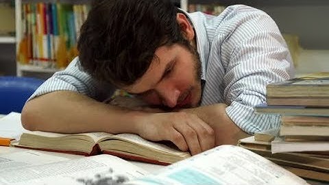 Male Student Wakes Up at the Library | Stock Footage - Videohive